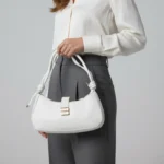 সাদা রঙের এই ট্রেন্ডি ব্যাগটি আপনার কালেকশনে মাস্ট হ্যাভ