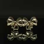 Chic Gold Double Bow Stud Earrings - Image 2