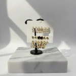Gold Studs & Huggie Hoop Earrings - Image 4