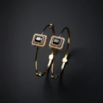 Stylish Gold Bracelets: Black Zirconia & Bell Charms