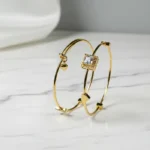 Gold Star Charm Bangle Bracelet - Elegant Women's Jewelry